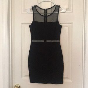 Black Forever 21 dress with sheer panels.